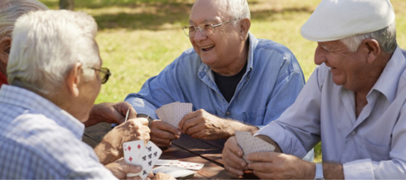 Men Playing a Card Game Men Playing a Card Game